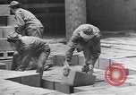 Image of Transport ships being loaded with troops and supplies for invasion task force United States USA, 1944, second 30 stock footage video 65675075793