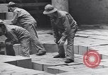 Image of Transport ships being loaded with troops and supplies for invasion task force United States USA, 1944, second 31 stock footage video 65675075793