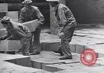 Image of Transport ships being loaded with troops and supplies for invasion task force United States USA, 1944, second 32 stock footage video 65675075793