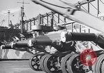 Image of Transport ships being loaded with troops and supplies for invasion task force United States USA, 1944, second 45 stock footage video 65675075793