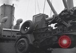 Image of Transport ships being loaded with troops and supplies for invasion task force United States USA, 1944, second 53 stock footage video 65675075793