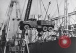 Image of Transport ships being loaded with troops and supplies for invasion task force United States USA, 1944, second 57 stock footage video 65675075793