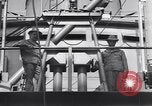 Image of Transport ships being loaded with troops and supplies for invasion task force United States USA, 1944, second 62 stock footage video 65675075793