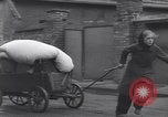 Standbild deutsche zivile Bewohner wieder in ihre Stadt Hinsbeck Deutschland, 1945, aus Sekunde 62 historischem Filmmaterial Videoclip 65675075902