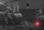 Standbild USA 3rd Armored Division Truppen in Bewegung durch die Stadt Niederhausen Deutschland, 1945, aus Sekunde 10 historischem Filmmaterial Videoclip 65675075904
