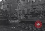 Standbild USA 3rd Armored Division Truppen in Bewegung durch die Stadt Niederhausen Deutschland, 1945, aus Sekunde 38 historischem Filmmaterial Videoclip 65675075904