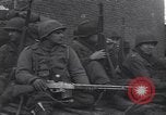 Standbild USA 3rd Armored Division Truppen in Bewegung durch die Stadt Niederhausen Deutschland, 1945, aus Sekunde 47 historischem Filmmaterial Videoclip 65675075904