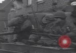 Standbild USA 3rd Armored Division Truppen in Bewegung durch die Stadt Niederhausen Deutschland, 1945, aus Sekunde 59 historischem Filmmaterial Videoclip 65675075904