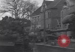 Standbild USA 3rd Armored Division Truppen in Bewegung durch die Stadt Niederhausen Deutschland, 1945, aus Sekunde 61 historischem Filmmaterial Videoclip 65675075904
