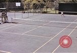 Standbild tennis match Honolulu Hawaii USA, 1945, aus Sekunde 16 historischem Filmmaterial Videoclip 65675075915