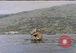 Image of outrigger canoe Pacific Ocean, 1945, second 3 stock footage video 65675075919