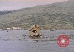 Image of outrigger canoe Pacific Ocean, 1945, second 4 stock footage video 65675075919