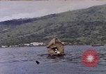 Image of outrigger canoe Pacific Ocean, 1945, second 6 stock footage video 65675075919
