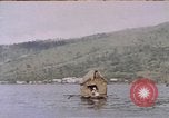 Image of outrigger canoe Pacific Ocean, 1945, second 7 stock footage video 65675075919