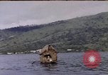 Image of outrigger canoe Pacific Ocean, 1945, second 9 stock footage video 65675075919