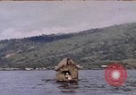 Image of outrigger canoe Pacific Ocean, 1945, second 11 stock footage video 65675075919