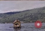 Image of outrigger canoe Pacific Ocean, 1945, second 12 stock footage video 65675075919