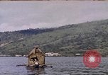 Image of outrigger canoe Pacific Ocean, 1945, second 14 stock footage video 65675075919