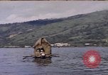Image of outrigger canoe Pacific Ocean, 1945, second 15 stock footage video 65675075919