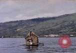 Image of outrigger canoe Pacific Ocean, 1945, second 18 stock footage video 65675075919