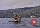Image of outrigger canoe Pacific Ocean, 1945, second 21 stock footage video 65675075919