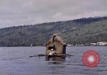 Image of outrigger canoe Pacific Ocean, 1945, second 23 stock footage video 65675075919