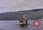 Image of outrigger canoe Pacific Ocean, 1945, second 24 stock footage video 65675075919