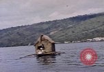 Image of outrigger canoe Pacific Ocean, 1945, second 26 stock footage video 65675075919