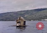 Image of outrigger canoe Pacific Ocean, 1945, second 27 stock footage video 65675075919