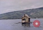 Image of outrigger canoe Pacific Ocean, 1945, second 28 stock footage video 65675075919