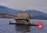 Image of outrigger canoe Pacific Ocean, 1945, second 32 stock footage video 65675075919