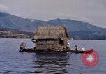 Image of outrigger canoe Pacific Ocean, 1945, second 33 stock footage video 65675075919