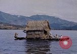 Image of outrigger canoe Pacific Ocean, 1945, second 34 stock footage video 65675075919