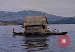 Image of outrigger canoe Pacific Ocean, 1945, second 36 stock footage video 65675075919
