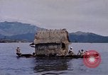 Image of outrigger canoe Pacific Ocean, 1945, second 40 stock footage video 65675075919