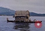 Image of outrigger canoe Pacific Ocean, 1945, second 42 stock footage video 65675075919
