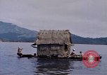 Image of outrigger canoe Pacific Ocean, 1945, second 43 stock footage video 65675075919