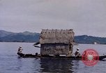Image of outrigger canoe Pacific Ocean, 1945, second 48 stock footage video 65675075919