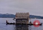 Image of outrigger canoe Pacific Ocean, 1945, second 49 stock footage video 65675075919