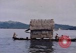 Image of outrigger canoe Pacific Ocean, 1945, second 50 stock footage video 65675075919
