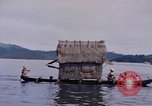 Image of outrigger canoe Pacific Ocean, 1945, second 52 stock footage video 65675075919