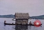 Image of outrigger canoe Pacific Ocean, 1945, second 55 stock footage video 65675075919