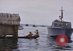 Image of outrigger canoe Pacific Ocean, 1945, second 58 stock footage video 65675075919