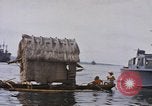 Image of outrigger canoe Pacific Ocean, 1945, second 62 stock footage video 65675075919