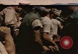 Image of Japanese prisoners leave captured submarines Pacific Theater, 1945, second 1 stock footage video 65675075961