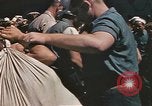 Image of Japanese prisoners leave captured submarines Pacific Theater, 1945, second 4 stock footage video 65675075961