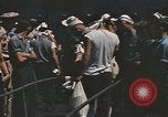 Image of Japanese prisoners leave captured submarines Pacific Theater, 1945, second 16 stock footage video 65675075961