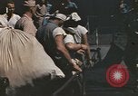 Image of Japanese prisoners leave captured submarines Pacific Theater, 1945, second 21 stock footage video 65675075961