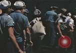 Image of Japanese prisoners leave captured submarines Pacific Theater, 1945, second 37 stock footage video 65675075961