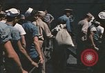 Image of Japanese prisoners leave captured submarines Pacific Theater, 1945, second 39 stock footage video 65675075961